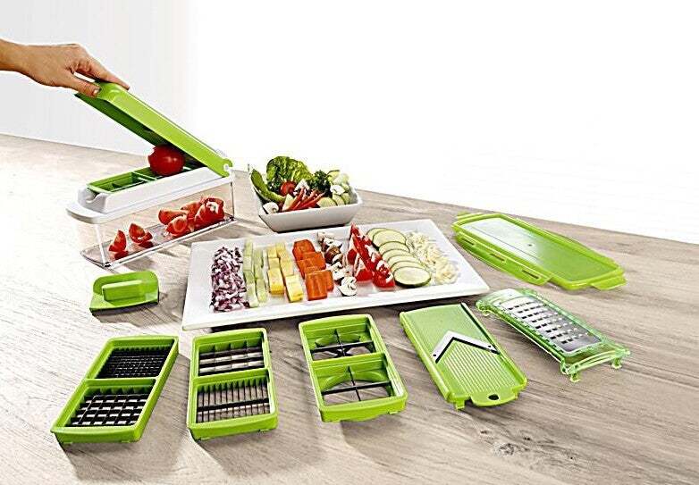 12pcs multifunctional vegetable chopper set with various slicing and dicing tools on a kitchen counter.