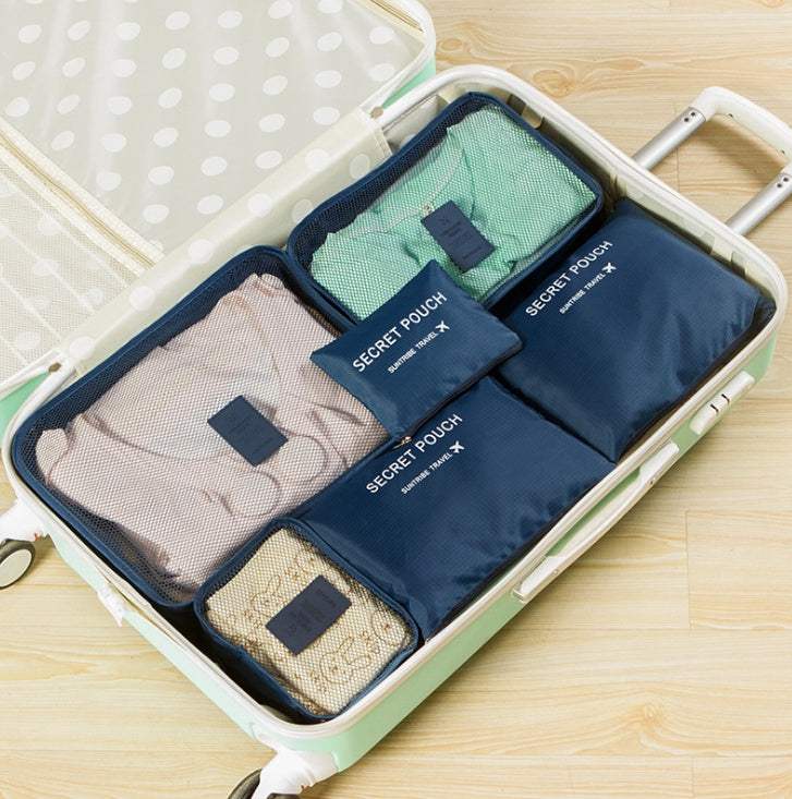 Durable waterproof nylon packing cube travel organizer bags in suitcase.