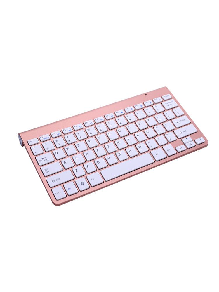 Rose gold wireless keyboard with white keys, USB interface, 1200dpi, ideal for home and office use.