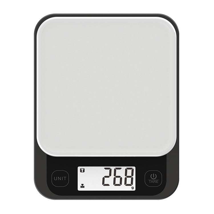 Digital smart kitchen scale with LCD display showing weight measurement in black.