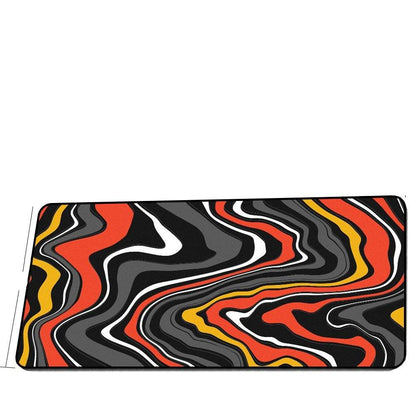 Extra long rubber mouse pad with colorful abstract wave design.