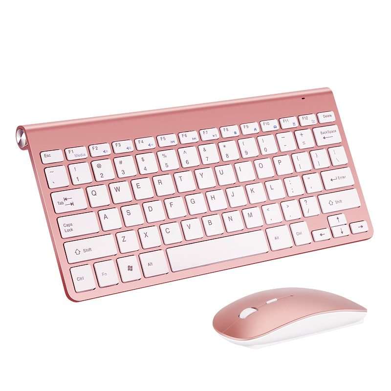 2.4G wireless keyboard mouse combo set in pink, optical resolution 1200dpi, USB interface, ABS plastic, ideal for home, office, game, notebook use.