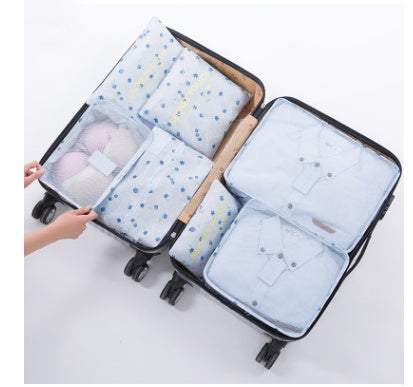 Durable waterproof nylon packing cubes in suitcase for organized travel.