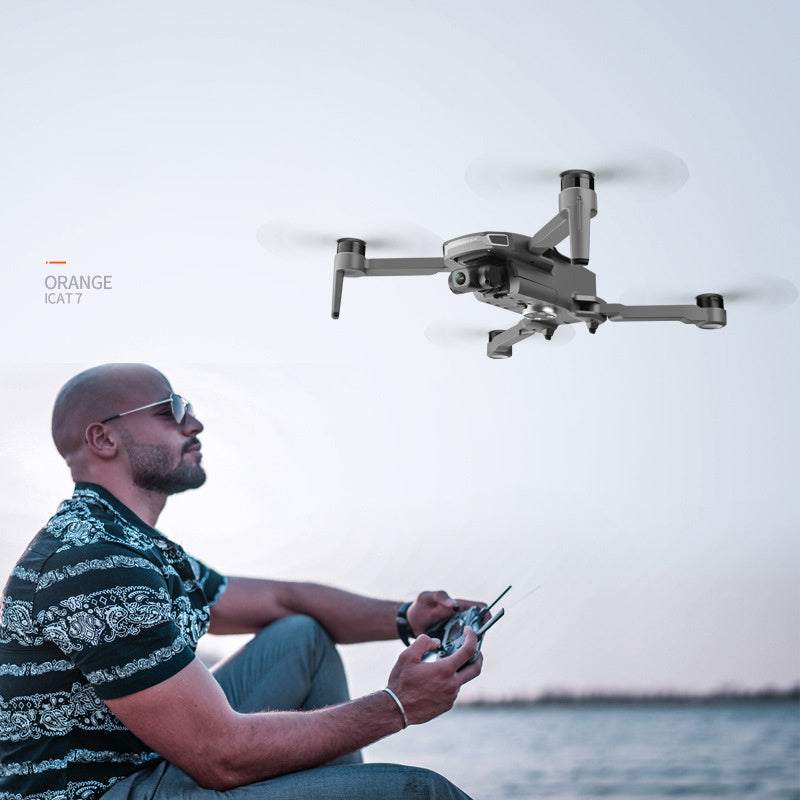 GPS drone with HD camera and stabilizing gimbal in flight.