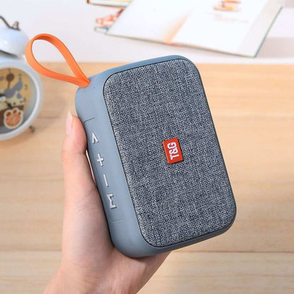 Portable Bluetooth speaker with call function, USB interface, radio support, and 600mAh battery.