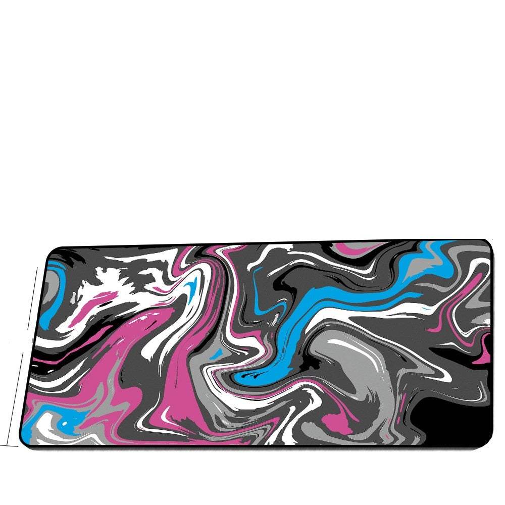 Extra long single-sided rubber mouse pad with colorful abstract design for gaming and office use.