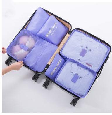 Nylon packing cubes in suitcase for organized travel packing.