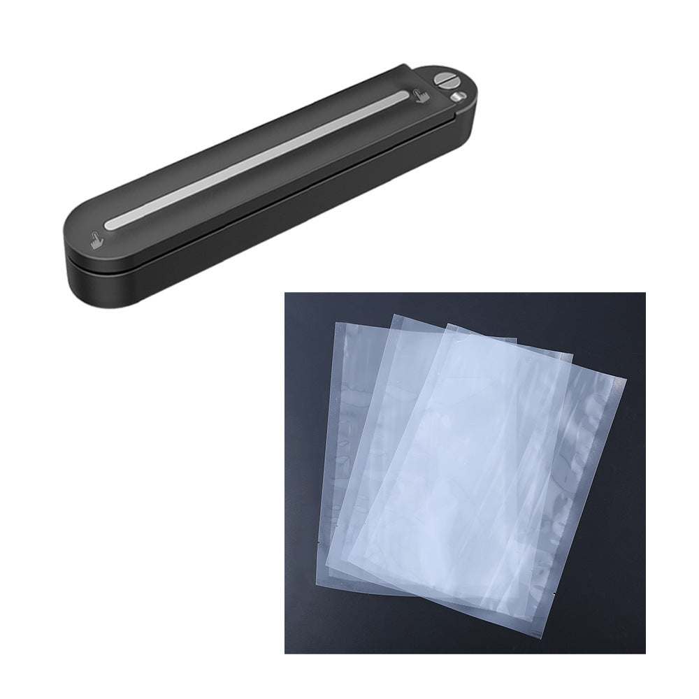 Black vacuum sealing machine with vacuum bags on a gray background.